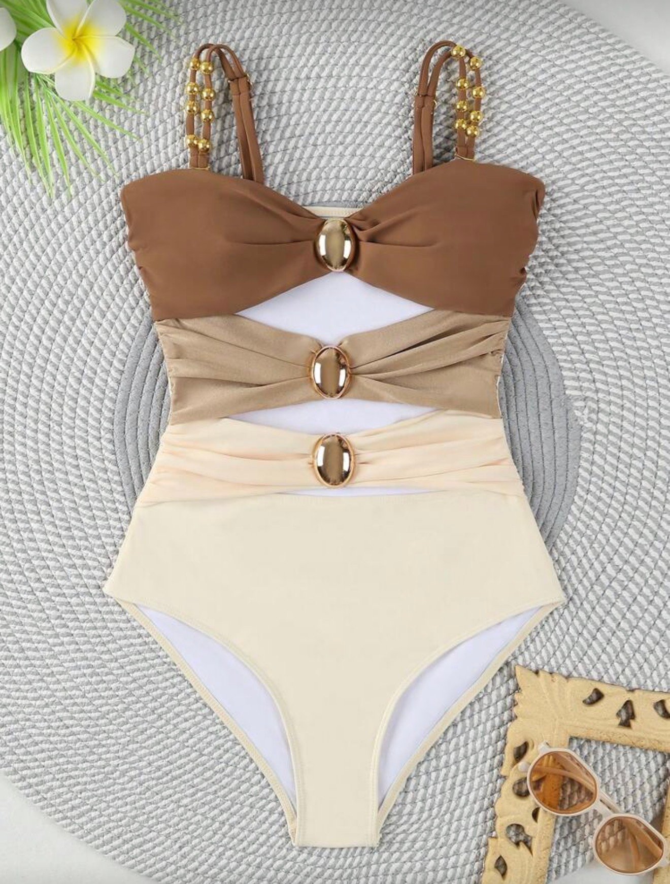 TRAJE DE BAÑO UNA PIEZA TONOS NUDE CON DETALLES DORADOS